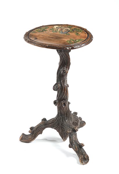 null Pedestal table in carved wood, molded and patinated, the round tray decorated...