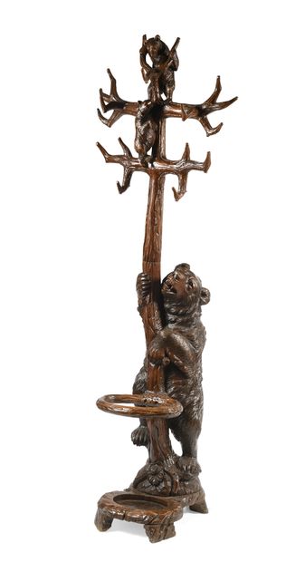 null Standing bear in carved and patinated wood forming a coat rack and umbrella...