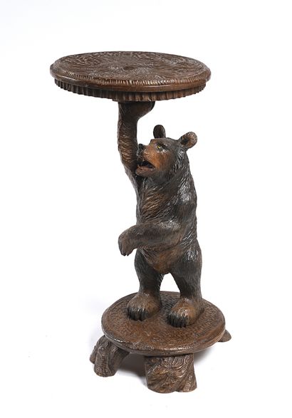 null Pedestal table in carved and patinated wood decorated with a bear supporting...