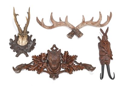 null Four coat racks, two in deer antlers or imitation, two in wood with a hunting...
