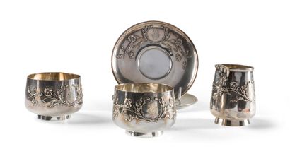 null Pair of chocolate cups, their saucers and milk jug in silver (Minerve 1st title)...