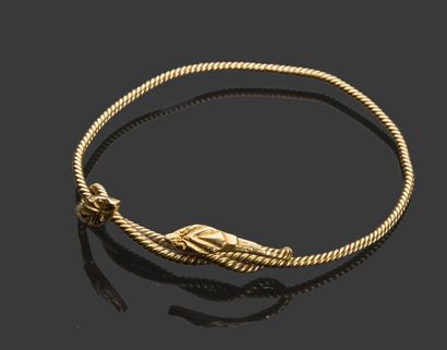 null Bracelet rigide en or (18K), torsadé deux serpents affontés.

Poids brut : 14,56...