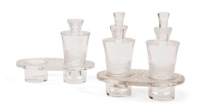 LALIQUE France Bourgeuil - 1933 

Pair of oil and vinegar cruets in pressed molded...