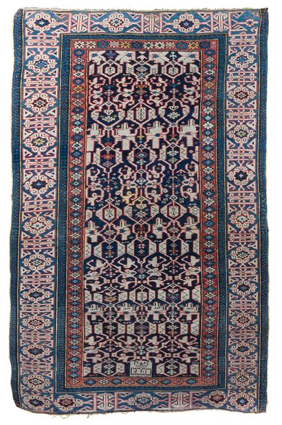 Ancien tapis du Caucase en laine à fond bleu...