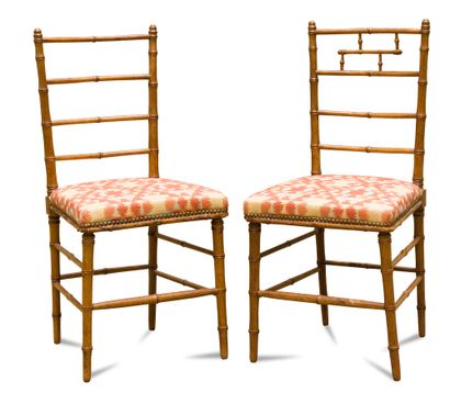 Pair of chairs with bamboo imitation bars....
