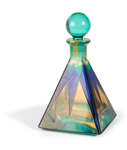 null CAROLI VENICE MURANO

Decanter with blue, green and yellow geometric decoration

Signed...