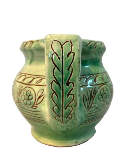 null Verseuse en céramique émaillée verte à décor ﬂoral
H. 15 x L. 27 cm