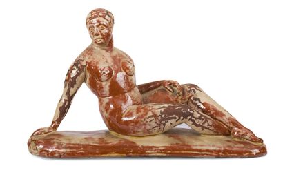 null Charles PICART LE DOUX (1881-1959)
Reclining nude
Ceramic sculpture glazed ochre...