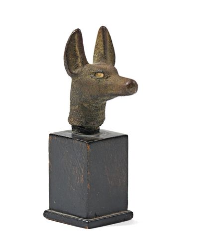 null Bronze head of Anubis on a wooden base
Egypt, Late Period (663-332 B.C.)
H....