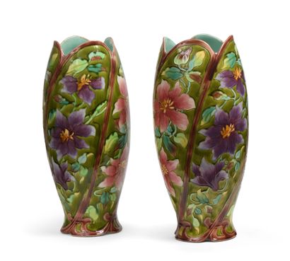 null LONGCHAMPS, iron ground
Pair of polychrome enamelled ceramic vases with floral...