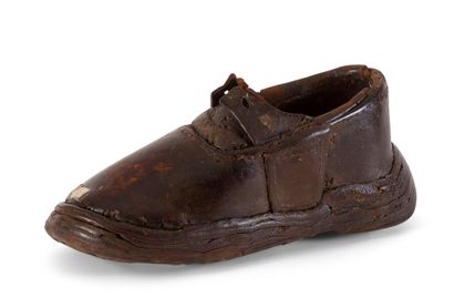 null Enseigne de cordonnier en cuir représentant une chaussure
Ancien travail régional
L....