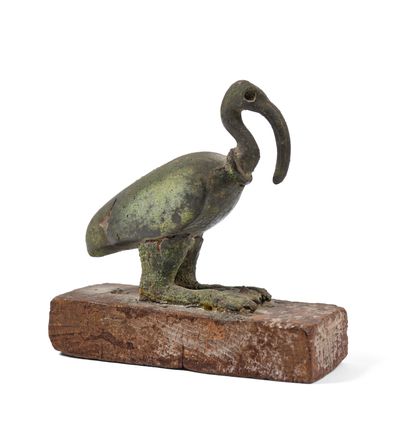 Ibis statuette in bronze on a wooden base
Egypt,...