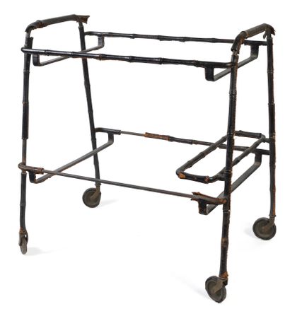 null Jacques ADNET (1900-1984)
Table roulante à double plateau en métal gainé de...