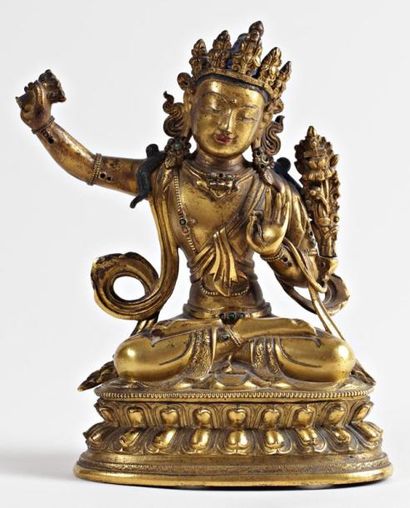 null SUJET EN BRONZE DORÉ REPRÉSENTANT LE DIEU MANJUSRI, rehaussé de pigment et incrusté...