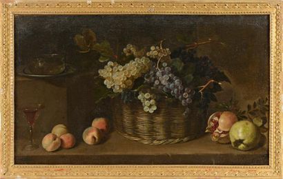 Ecole française, XVIIème siècle Nature morte aux raisins, pêches et grenades. Huile...