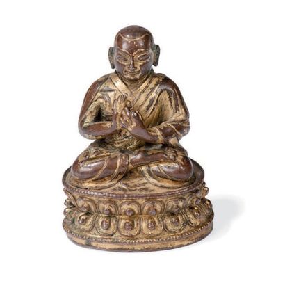 null Statuette en bronze doré Représentant un moine lama assis sur un lotus, faisant...