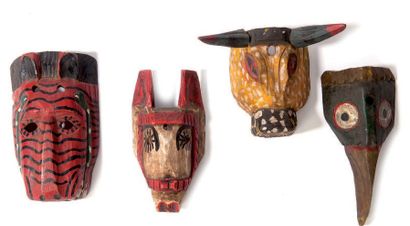 null Suite de quatre masques
En bois sculpté polychrome a décor d'animaux fantastique
H:...