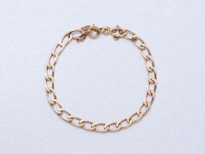 null Bracelet en or 750 millièmes, maille gourmette, agrémenté d'un fermoir anneau...