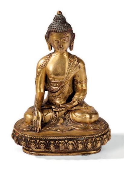 null Statuette en bronze doré
Représentant le bouddha assis sur un lotus en bhumisparsa...