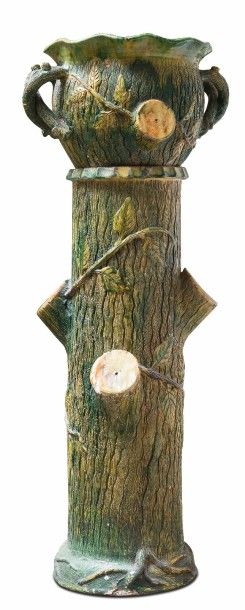 null Colonne en céramique émaillée polychrome imitant un tronc d’arbre

H. 115 cm,...