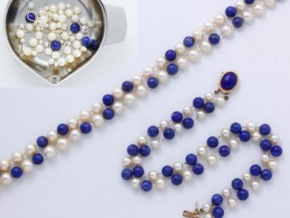 null Ensemble en perles de lapis lazuli teint
Alternées de perles de culture, composé...