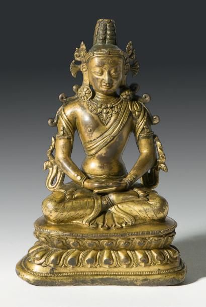 null Statuette en bronze doré
Représentant Amitayus assis en samadi sur un double...