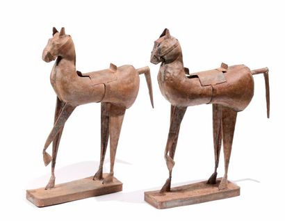 null Paire de chevaux en tôle peinte

Travail indien

H. 83 cm