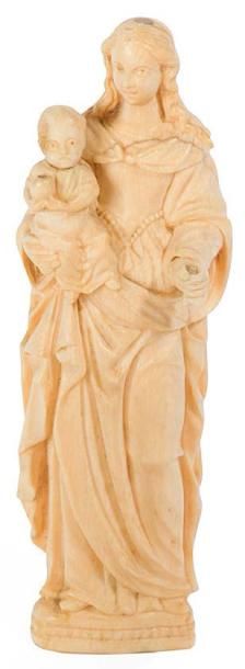 Ecole française fin XVIIIème siècle † Vierge à l'enfant
Statuette en ivoire sculpté.
(accidents).
H.12,5...