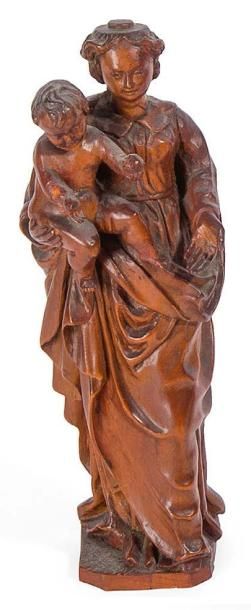 Ecole française XVIIème siècle † Vierge à l'enfant.
Statuette en buis sculpté et...