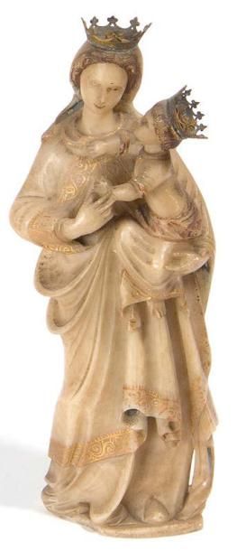 ECOLE FRANCAISE XIXeme SIECLE † Vierge à l'enfant
Statuette en albâtre sculpté, mouluré...