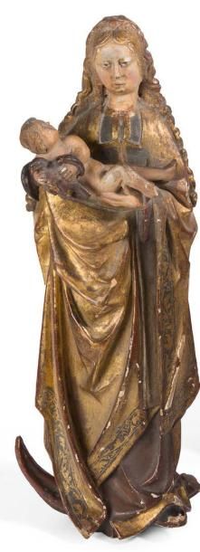 ECOLE FRANCAISE † Vierge à l'enfant.
Sculpture en chêne laqué et doré (accidents...