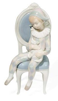 LLADRO Arlequin sur une chaise
Sculpture en porcelaine polychrome signée sous la...
