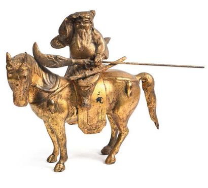 CHINE vers 1900 Cavalier
Sculpture en fonte de fer doré
32 x 35 cm