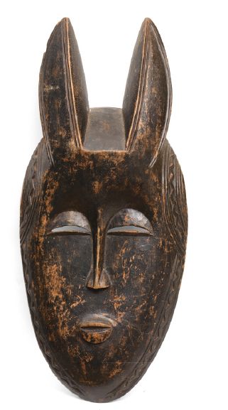 null Peuple DOGON - Mali
Masque en bois sculpté et patiné.
H: 33 cm