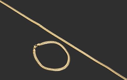 null Collier et bracelet en or jaune 750° à maille anglaise
Pb: 38.1 gr