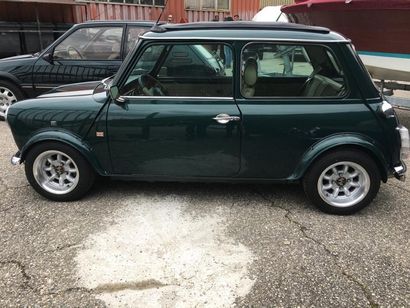 MINI BRITISH OPEN 1.3L CARBU - 1994 Toit ouvrant souple, joli intérieur, volant en...