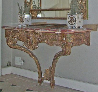 null Carved and gilded wood console, woman's head and floral decoration. Royal marble...