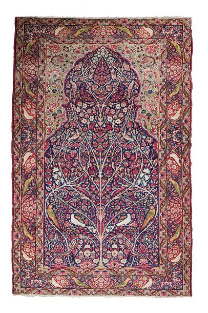 null KIRMAN-LAVER (Persia), woven around 1870 

Elegant prayer-shaped carpet where...