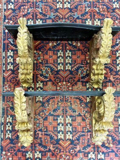 null Pair of 19th century carved and gilded wood wall consoles. From the Louis Mariano...