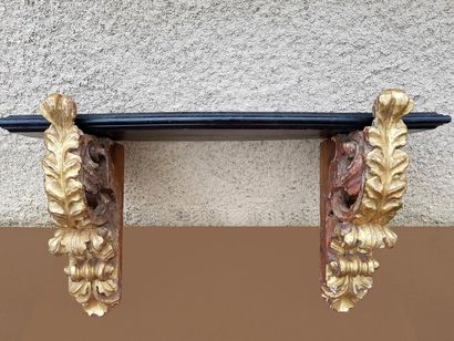 null Pair of 19th century carved and gilded wood wall consoles. From the Louis Mariano...