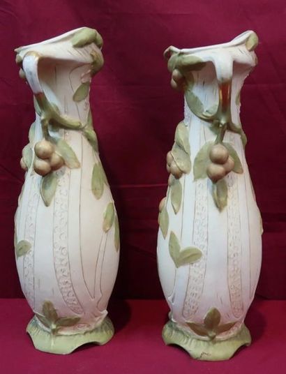 null Pair of Royal DUX Art Nouveau porcelain vases with relief decoration of leaves...