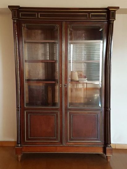 null 2-door showcase. Mahogany detached columns and brass threads. Height. 220 cm...