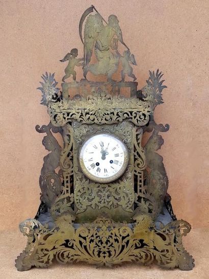 null Rare and curious cut-out copper clock decorated with passing time and caryatids....
