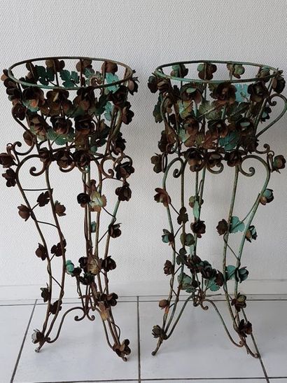 null Pair of wrought iron planters with foliage and flower decoration. Height. 105...