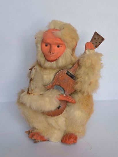null Automaton RD; The monkey guitarist, early XX°. Boiled cardboard, metal, fur...