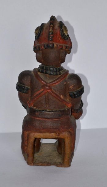 null Figurine en terre, modelée et polychrome du Dahomey: La cuisinière. XX°. Ht....