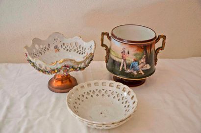 null Set consisting of a polychrome porcelain and gold pedestal bowl, a pot holder...