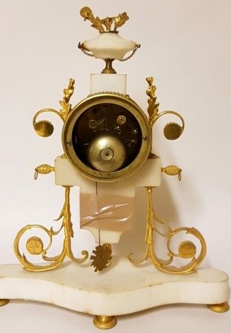 null White marble and gilt bronze clock decorated with a Wedgwood medallion. LEROY...