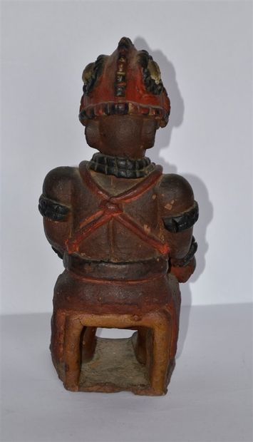 null Figurine en terre, modelée et polychrome du Dahomey: La cuisinière. XX°. Ht....