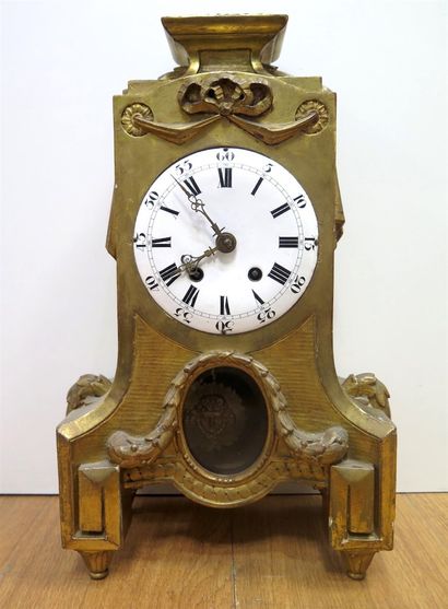 null Gold-plated wooden clock. Ht. 50 cm approximately. Louis XVI style, made in...